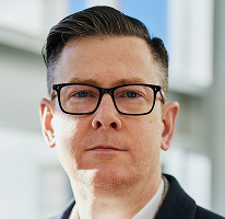 Alexander Hughes CEO Portrait Krypto-Trading-Unternehmen Führungskraft